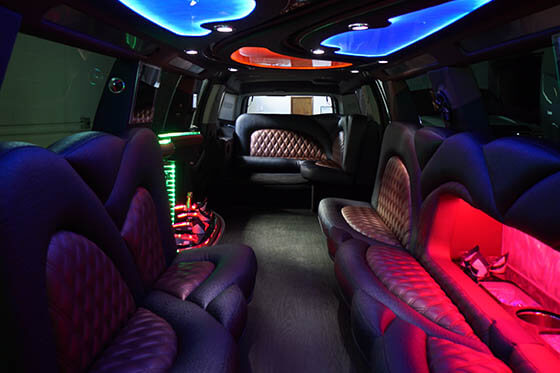 20-passenger escalade limo interior with neon lights