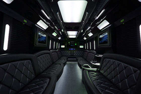 24-passenger bus interior 2 with several tvs